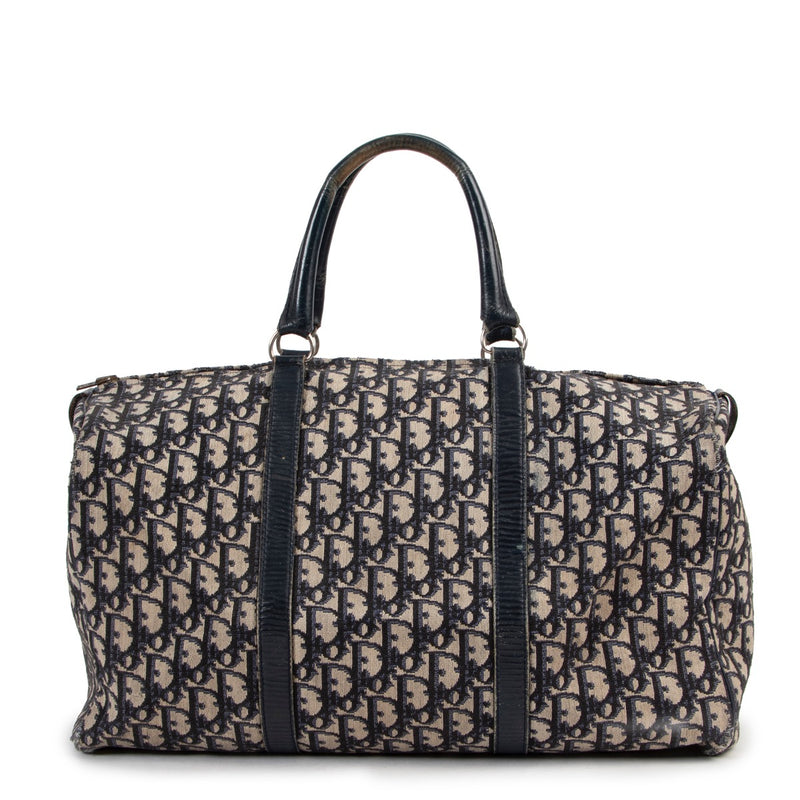Christian Dior Blue Monogram Travel Bag now available at Labellov. Buy and sell your designer items at Labellov Luxury for a reasonable price and in good condition.