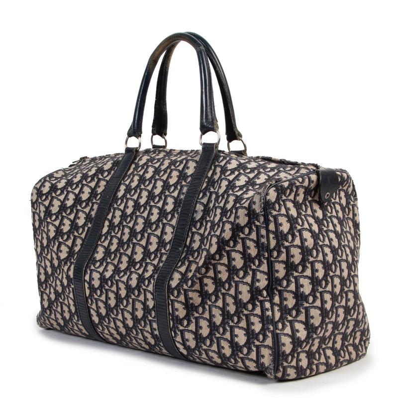 Christian Dior Blue Monogram Travel Bag now available at Labellov. Buy and sell your designer items at Labellov Luxury for a reasonable price and in good condition.