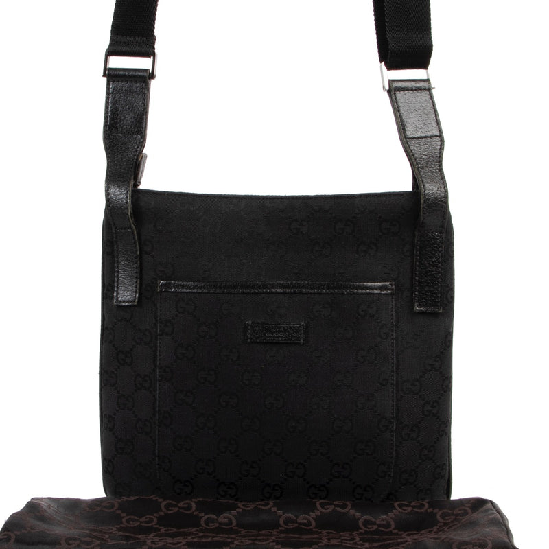 Gucci Black GG Canvas Messenger Crossbody Bag now available for selling online or in store at Labellov Luxury