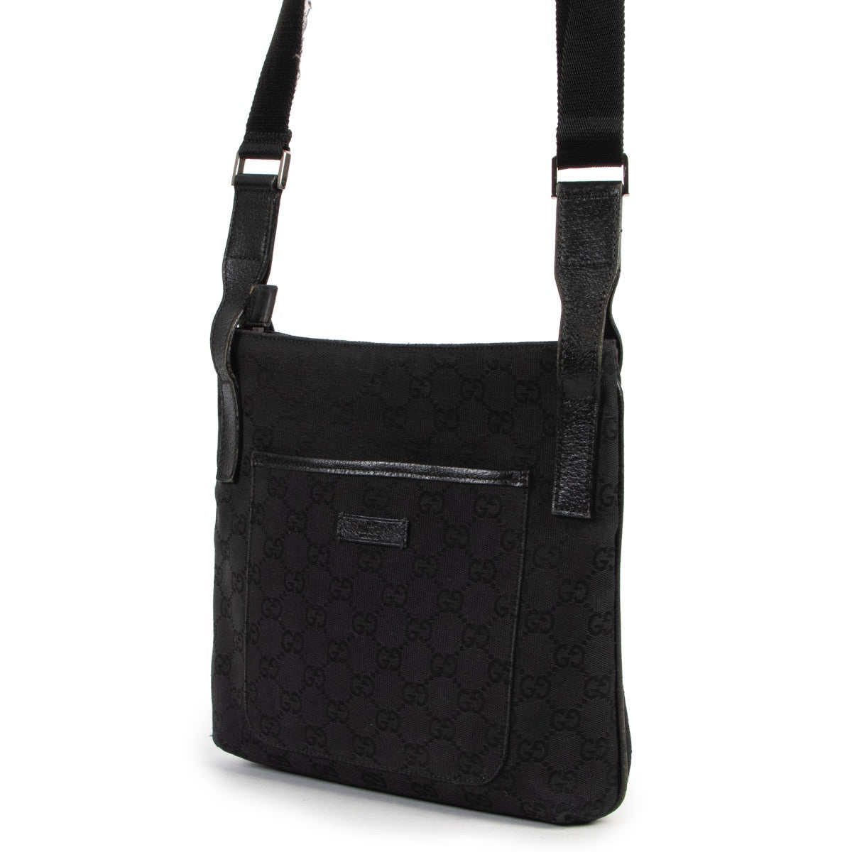 Gucci Black GG Canvas Messenger Crossbody Bag now available for selling online or in store at Labellov Luxury