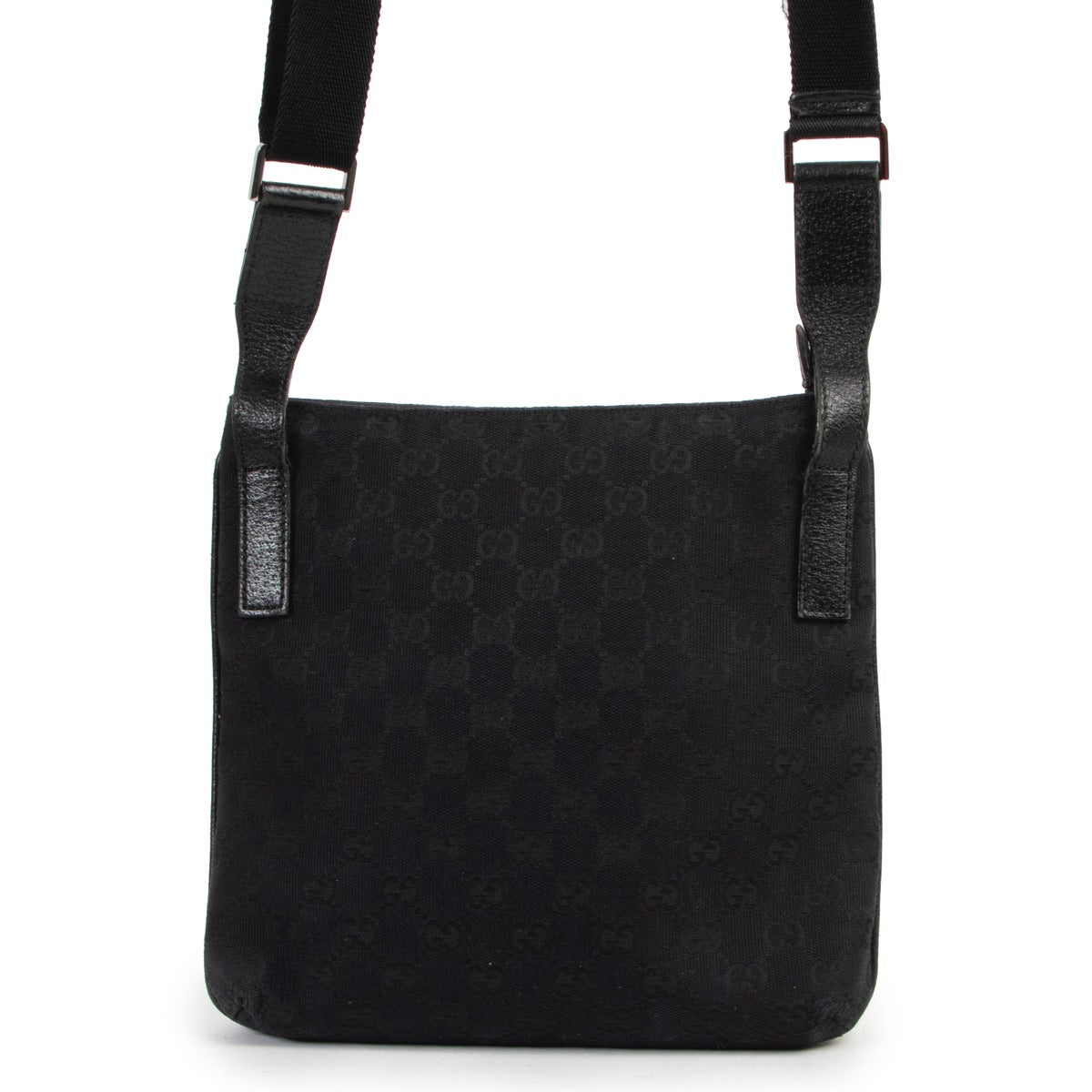 Gucci Black GG Canvas Messenger Crossbody Bag now available for selling online or in store at Labellov Luxury