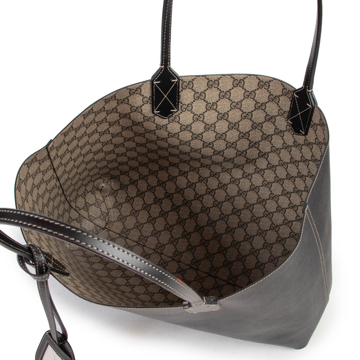Shop safe online 100% authentic second hand Gucci Monogram/ Black Canvas Reversible Tote Shoulder Bag at Labellov in Antwerp.