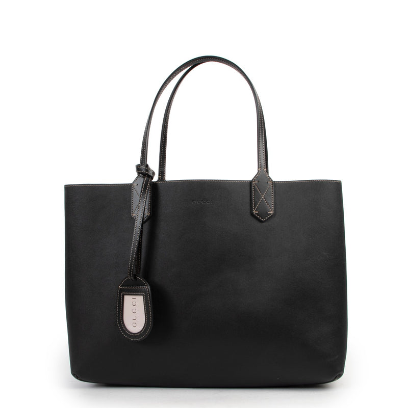 Shop safe online 100% authentic second hand Gucci Monogram/ Black Canvas Reversible Tote Shoulder Bag at Labellov in Antwerp.