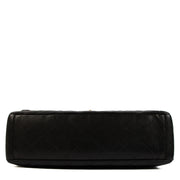 Chanel Black Maxi Caviar Classic Single Flap Bag for the best price at Labellov secondhand luxury in Antwerp. We buy and sell your preloved and brand new designer bags for the best price.