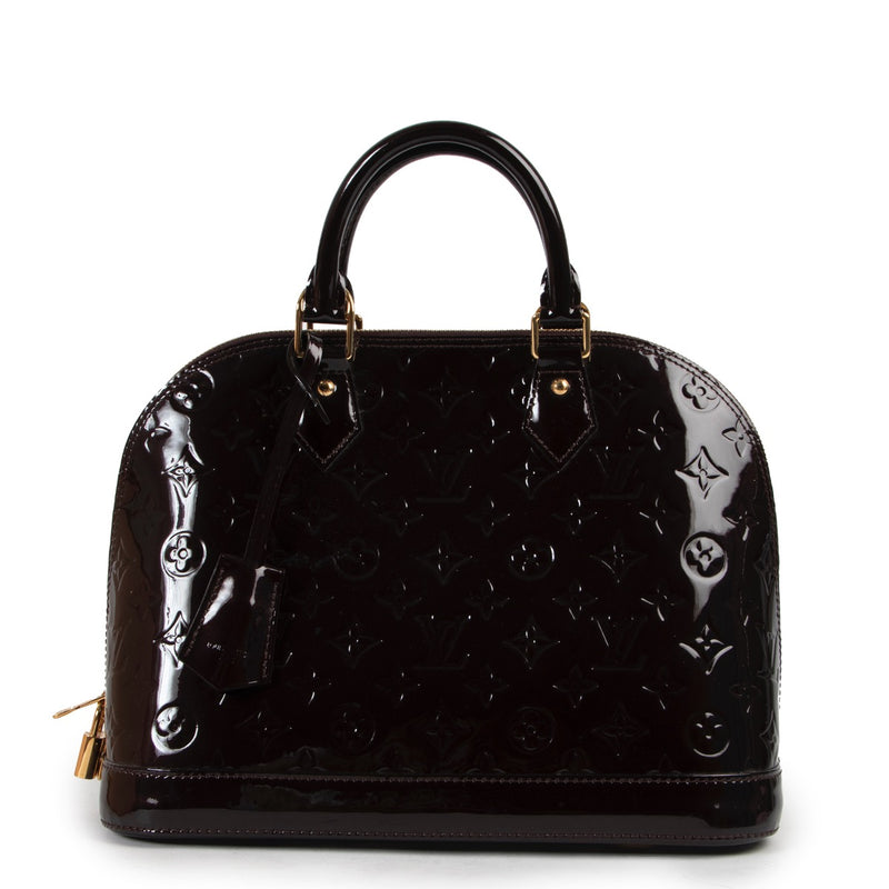 Shop safe online at Labellov in Antwerp this 100% authentic Louis Vuitton Vernis Amarante Alma PM in very good condition.