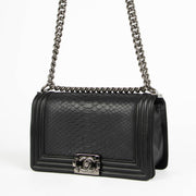 Chanel Black Python Medium Boy Bag aan de beste prijs bij Labellov tweedehands luxe in Antwerpen en Knokke.