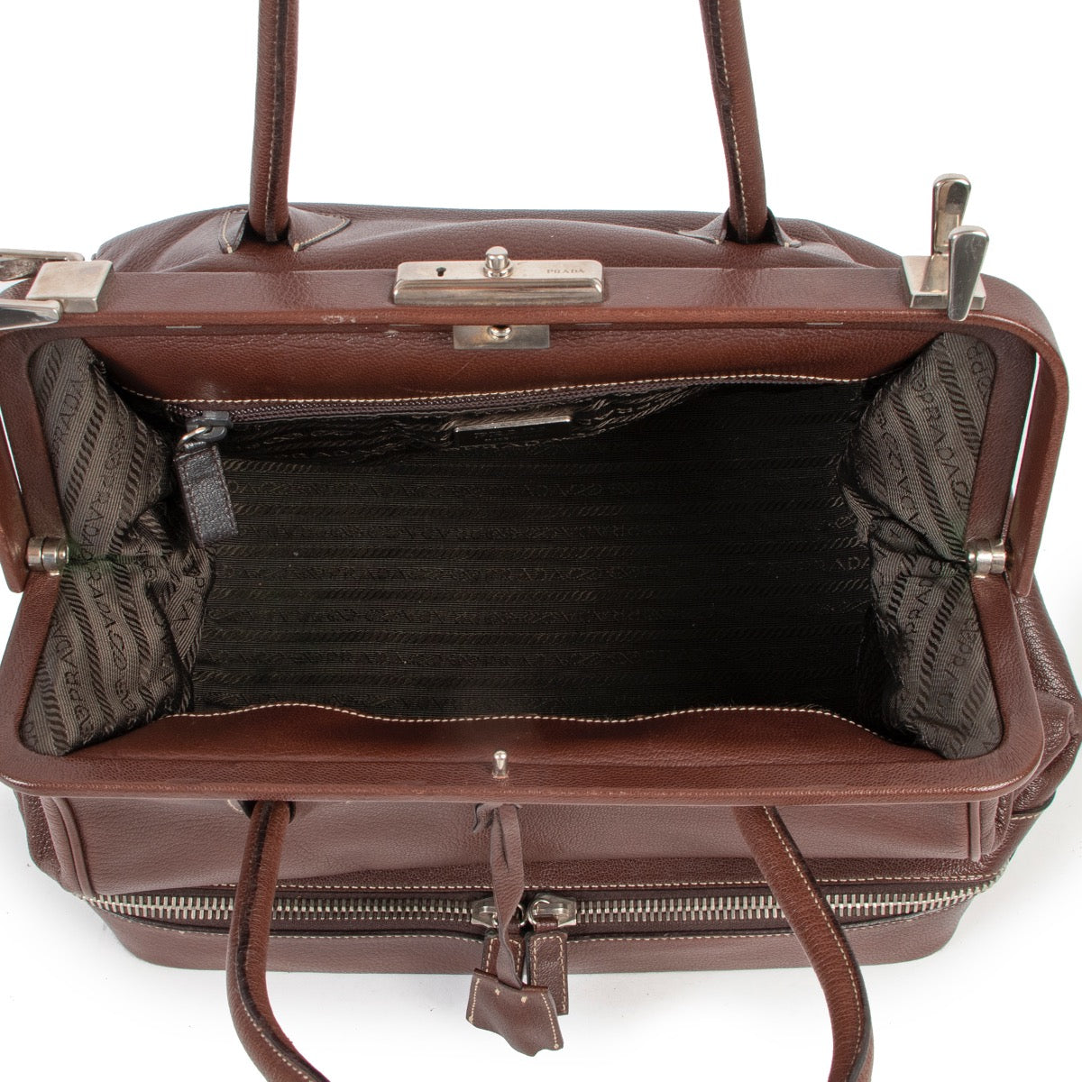 Shop safe online 100% authentic second hand Prada Brown Leather Cerniera Top Handle in very good condition.