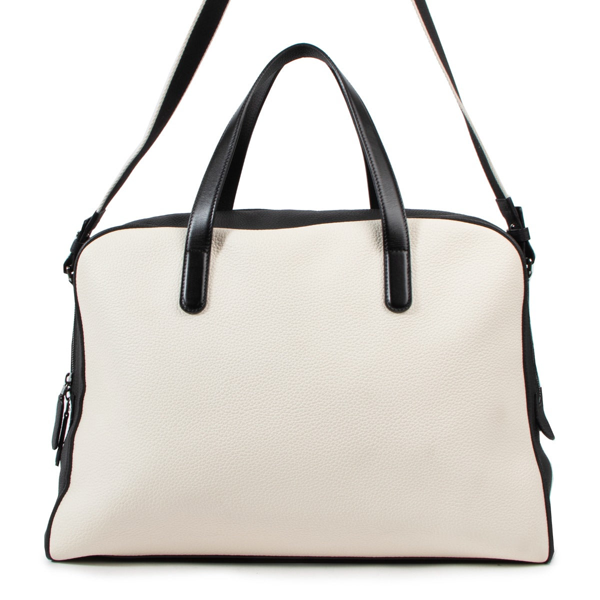 Buy an authentic vintage Delvaux Black Ivory White Leather D-Off Magritte Travel Bag in very good condition at Labellov Antwerp.