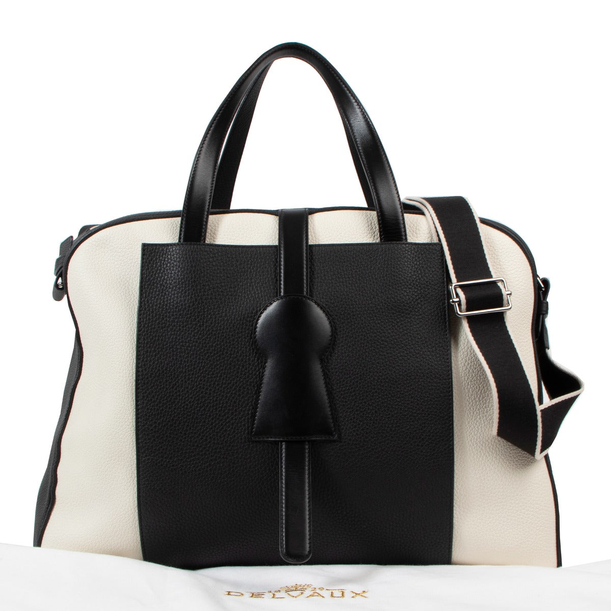 Buy an authentic vintage Delvaux Black Ivory White Leather D-Off Magritte Travel Bag in very good condition at Labellov Antwerp.