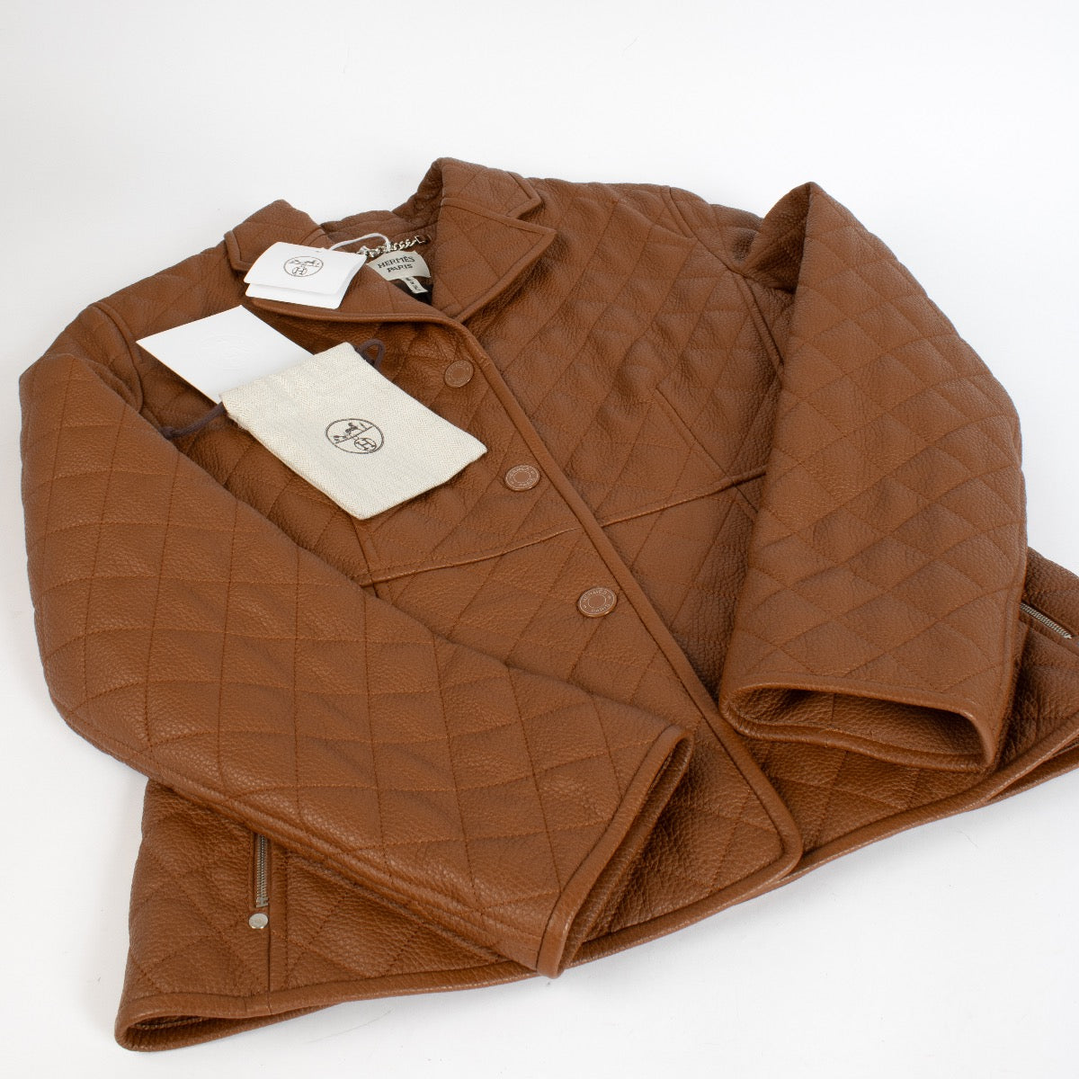 Veste équestre Hermès en cuir de chevreuil matelassé, couleur Fauve Marron - Taille FR42