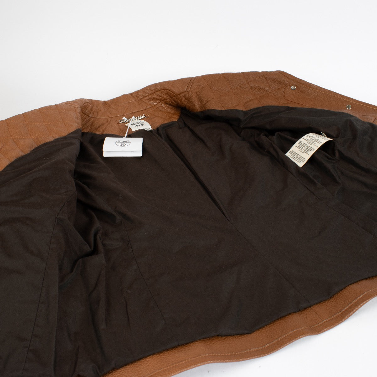 Veste équestre Hermès en cuir de chevreuil matelassé, couleur Fauve Marron - Taille FR42