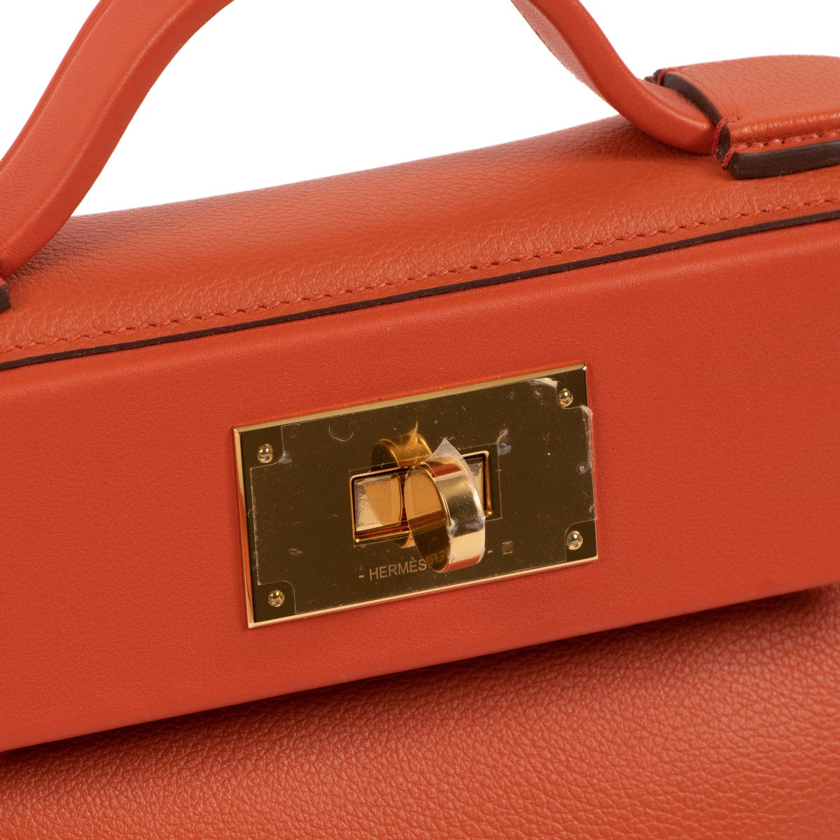 Hermes 24/24 logo engraving detail