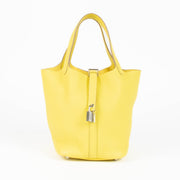 Are you looking for an authentic designer accessory? We buy and sell your preloved and brand new Hermès Picotin Lock 18 Lime Clemence PHW Top Handle Bag.