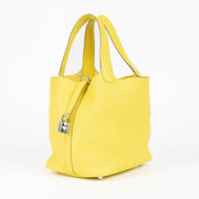 Are you looking for an authentic designer accessory? We buy and sell your preloved and brand new Hermès Picotin Lock 18 Lime Clemence PHW Top Handle Bag.