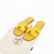Hermès Yellow Suede Oran Sandals for the best price at Labellov secondhand luxury in Antwerp and Knokke.
