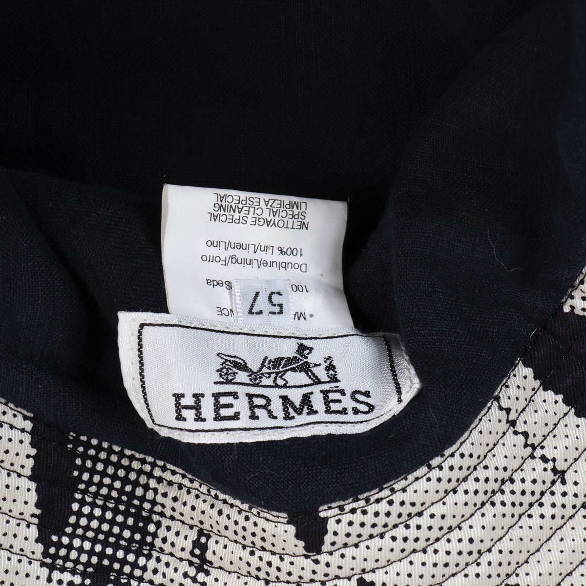 Shop safe online at Labellov in Antwerp this 100% authentic second hand Hermès Black and White Hat - Size 57