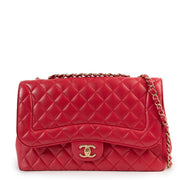 Shop safe online at Labellov in Antwerp this 100% authentic second hand Chanel Timeless Jumbo Raspberry Quilted Leather Flap Bag