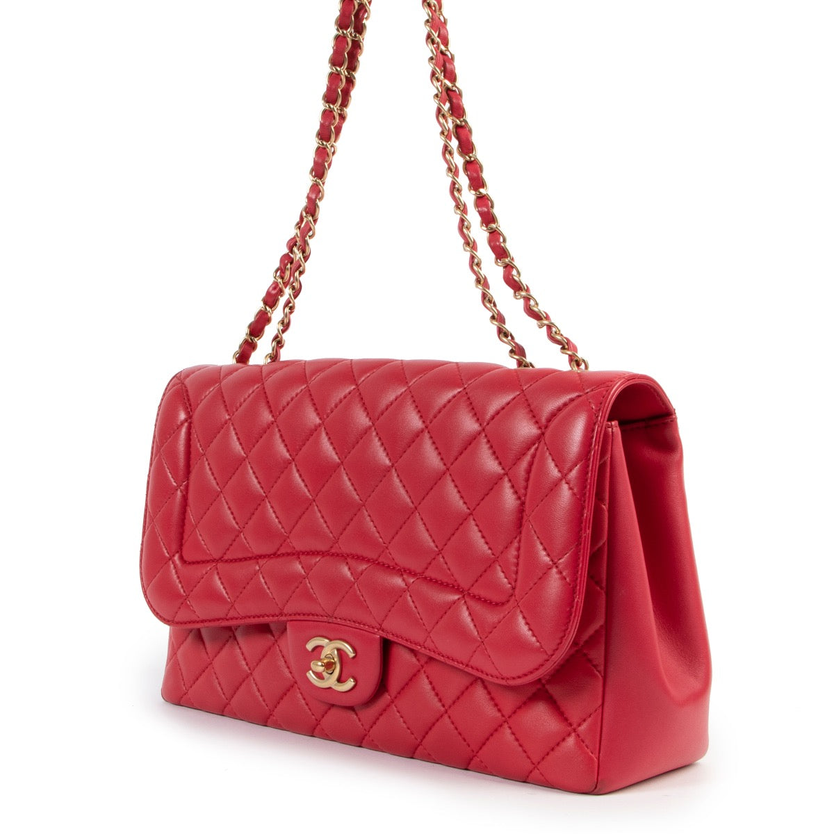 Shop safe online at Labellov in Antwerp this 100% authentic second hand Chanel Timeless Jumbo Raspberry Quilted Leather Flap Bag