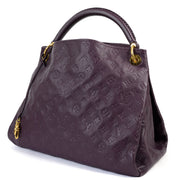Shop safe online at Labellov in Antwerp this 100% authentic second hand Louis Vuitton Purple Monogram Empreinte Leather MM Artsy Shoulder Bag
