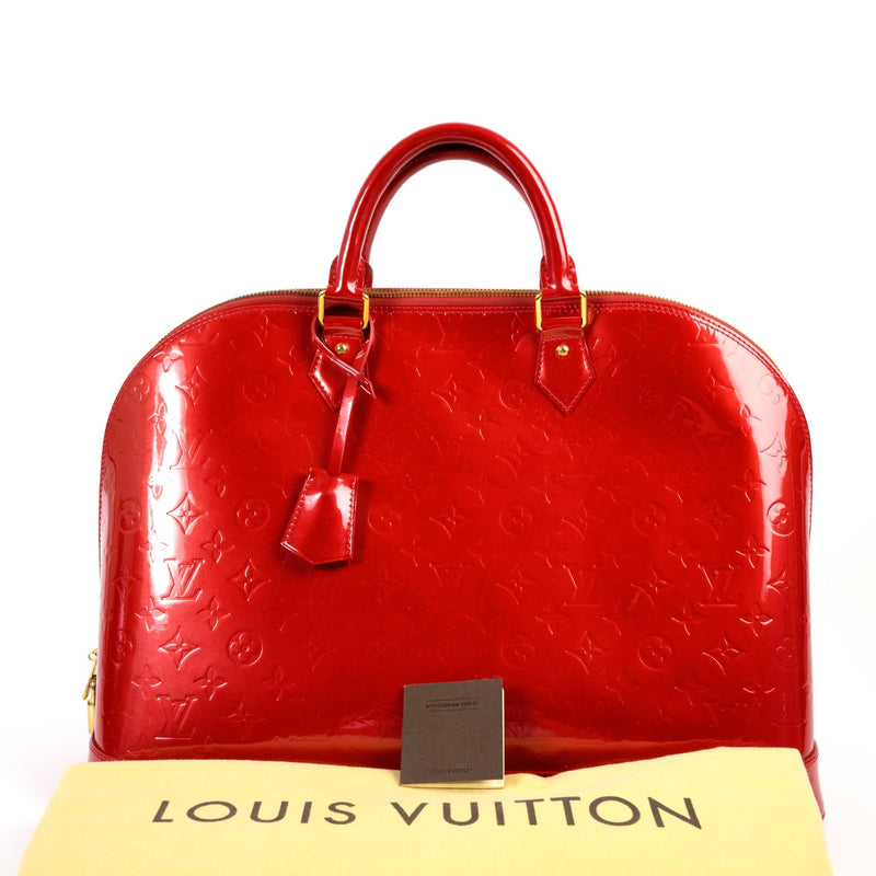 Shop safe online 100% authentic second hand Louis Vuitton Alma GM Vernis Pomme d'Amour in very good condition at Labellov in Antwerp.
