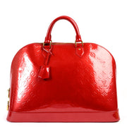 Shop safe online 100% authentic second hand Louis Vuitton Alma GM Vernis Pomme d'Amour in very good condition at Labellov in Antwerp.