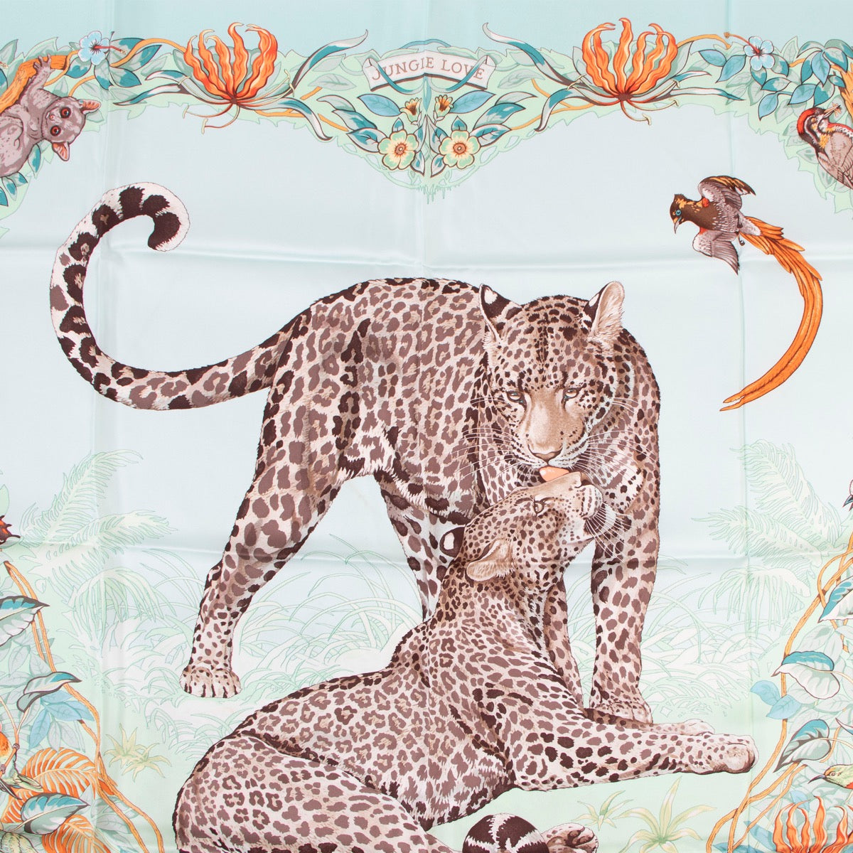 Buy online an authentic second hand Hermès Turquoise Jungle Love Carré 90 Silk Scarf in very good condition at Labellov in Antwerp.