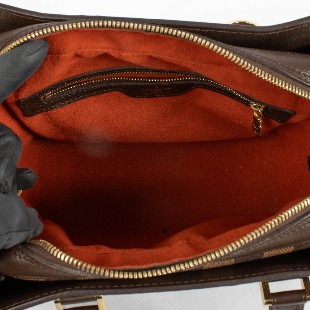 Authentic preloved Louis Vuitton Damier Ebene Triana Bag on labellov.com