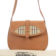 Shop authentic second hand luxury designer vintage Burberry Vintage Saddle Camel Check Crossbody Bag at Labellov