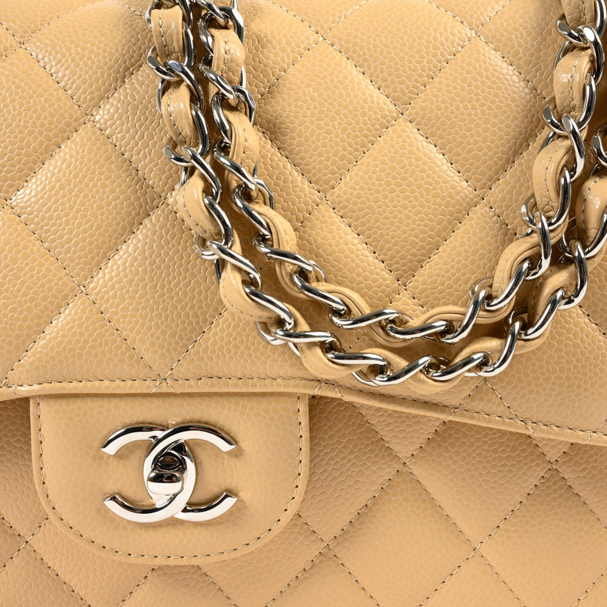 Shop Safe online at Labellov in Antwerp this 100% authentic second hand Chanel Beige Caviar Leather Classic Flap Bag Jumbo in as new condition.