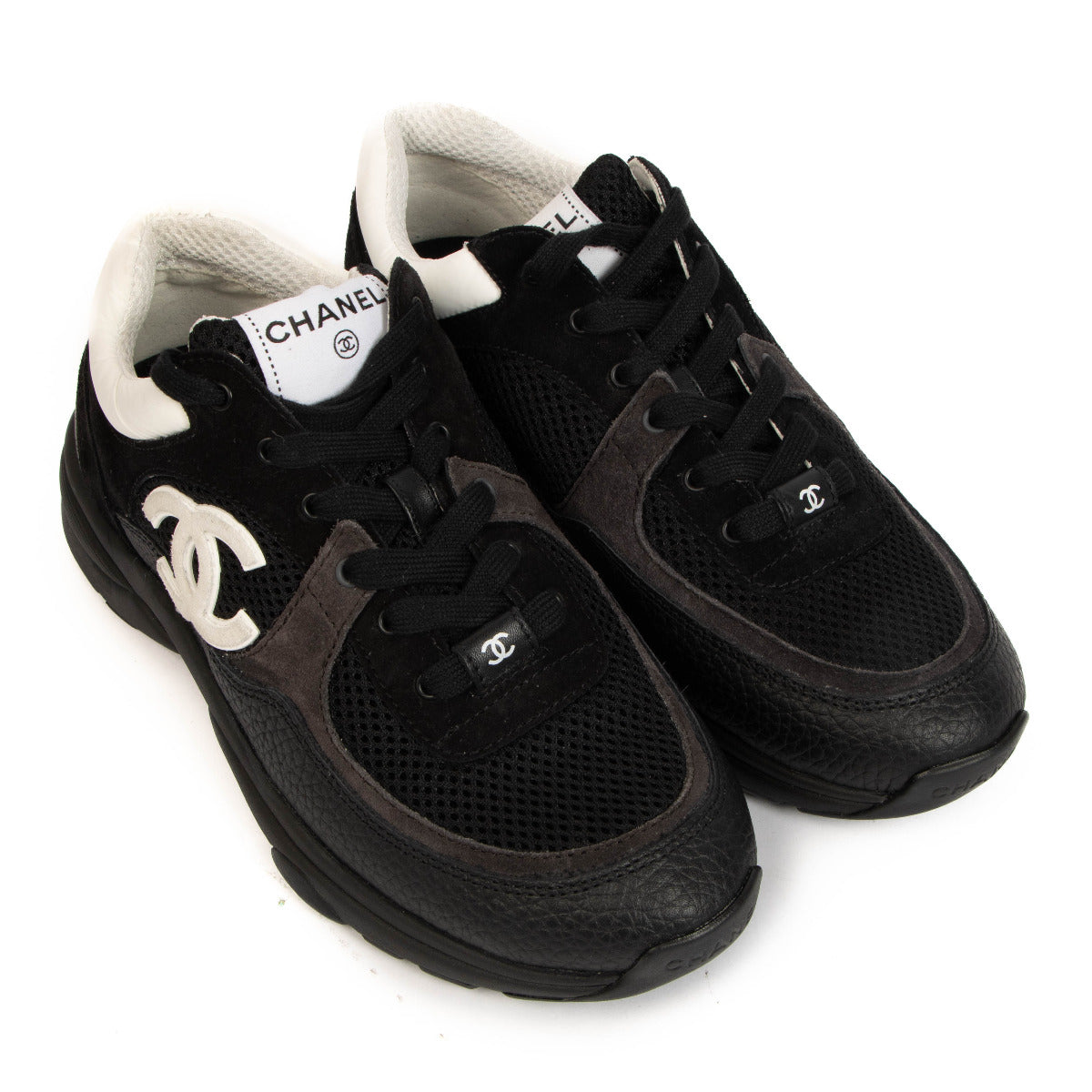Chanel 22S Black Logo Sneakers for the best price at Labellov secondhand luxury in Antwerp