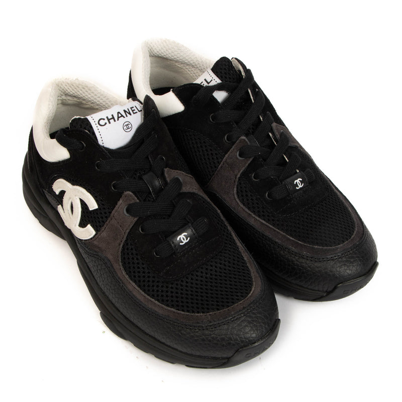 Chanel 22S Black Logo Sneakers for the best price at Labellov secondhand luxury in Antwerp