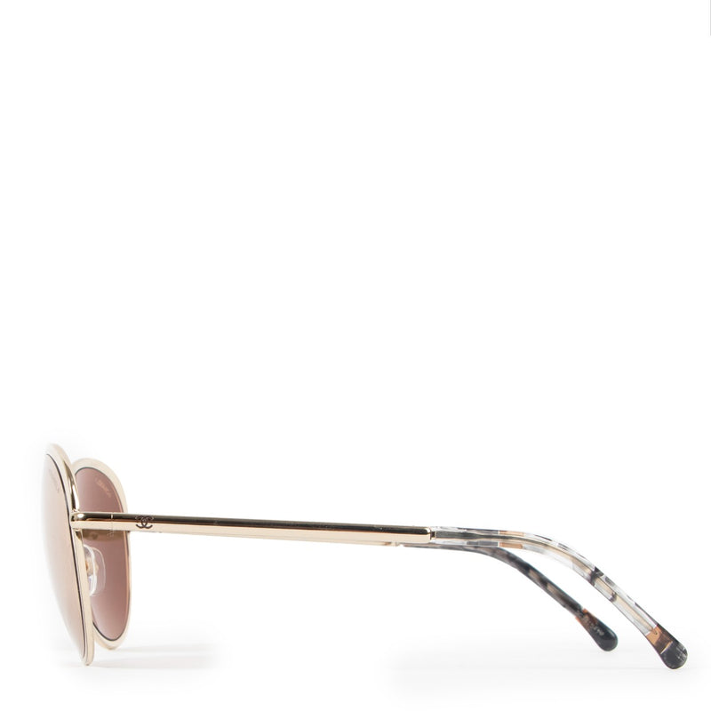 Authentic second hand Chanel Gold Metal Round CC Logo Sunglasses 4206 at Labellov.com