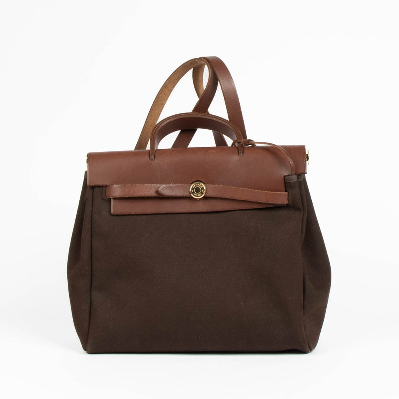 Authentic pre-loved Hermès Herbag 28 2-In-1 Brown Canvas/Leather GHW Backpack on Labellov.com
