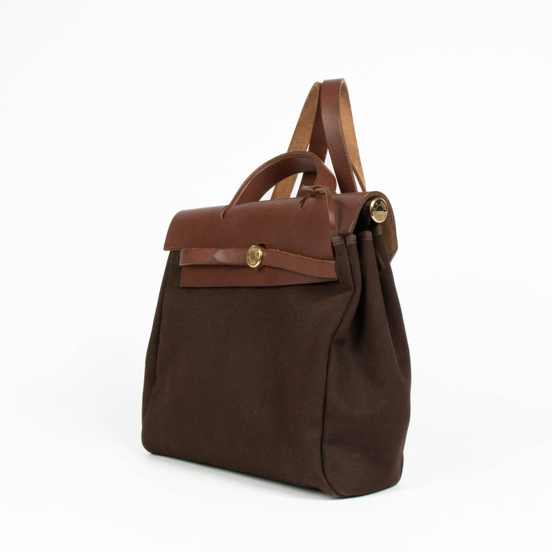 Authentic pre-loved Hermès Herbag 28 2-In-1 Brown Canvas/Leather GHW Backpack on Labellov.com