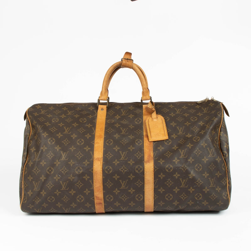 Authentic pre-loved Louis Vuitton Monogram Vintage Keepall 55 Bag on Labellov.com