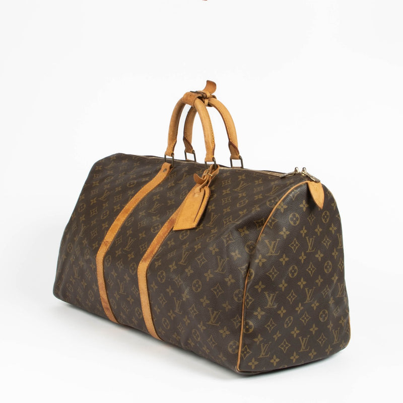 Authentic pre-loved Louis Vuitton Monogram Vintage Keepall 55 Bag on Labellov.com