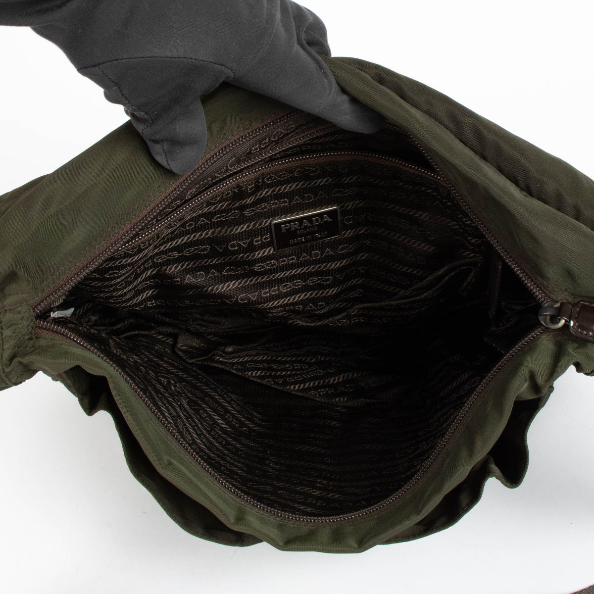 Authentic pre-loved Prada Green Nylon Messenger Shoulder Bag on Labellov.com