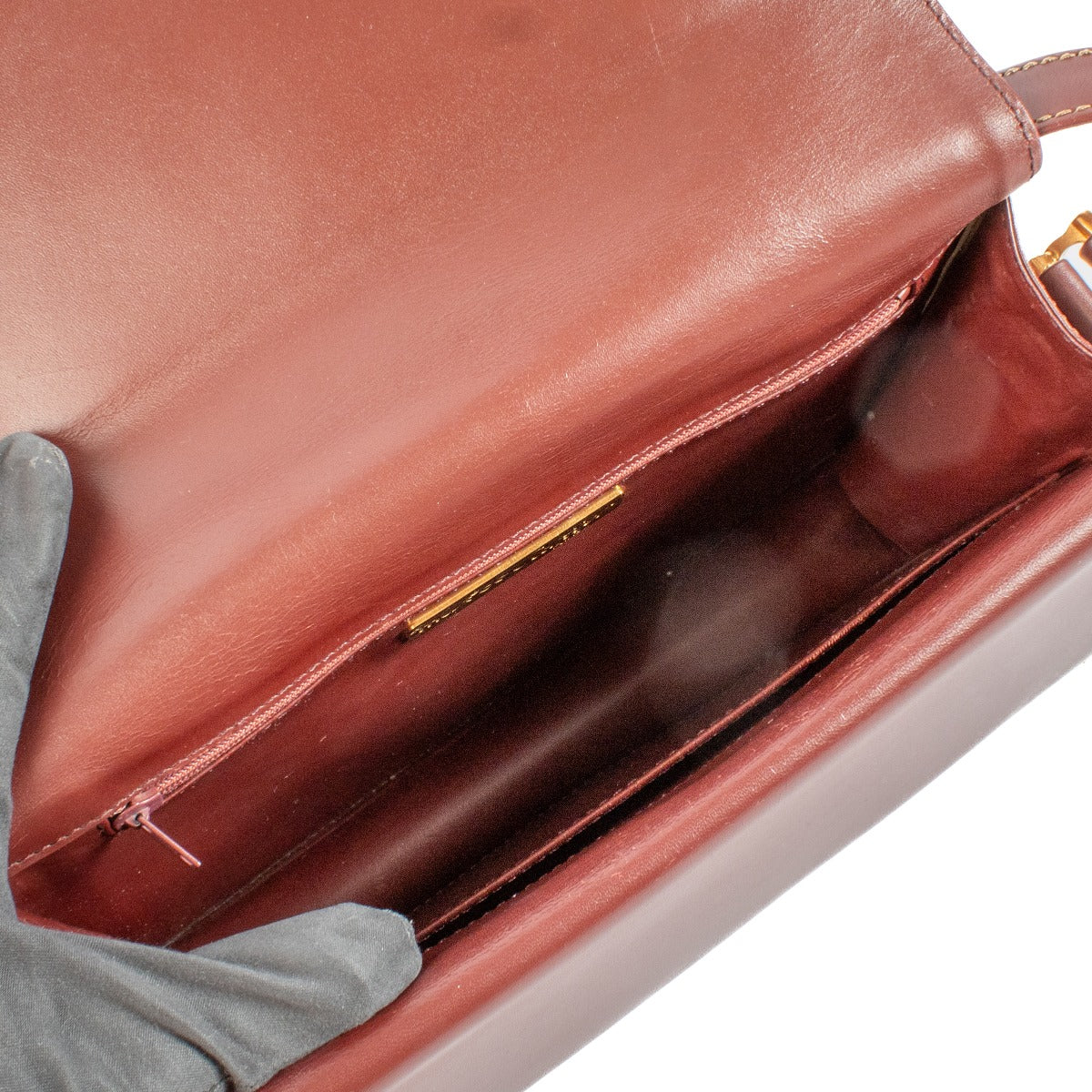 Shop safe online at Labellov in Antwerp, Brussels and Knokke this 100% authentic second hand Cartier Burgundy Vintage Crossbody Bag