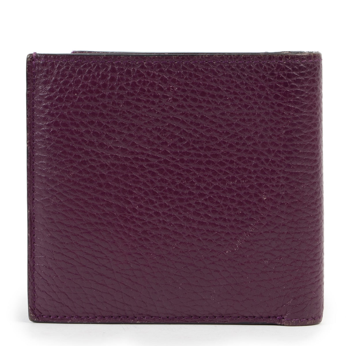 Shop safe online at Labellov in Antwerp this 100% authentic second hand Hermès Purple Leather Wallet