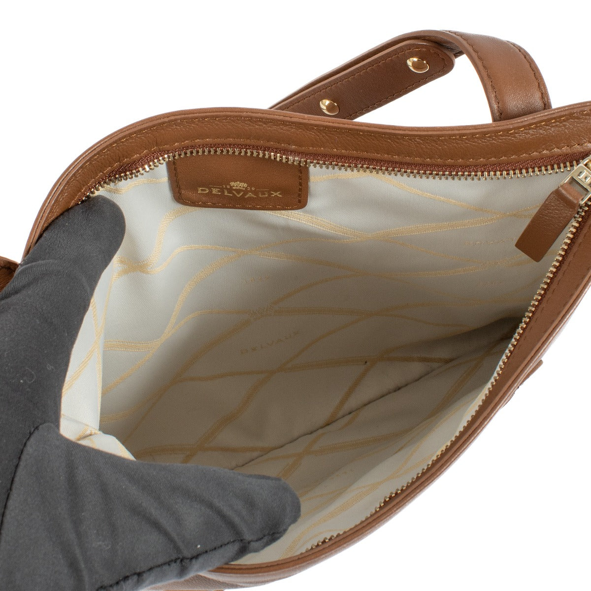 Shop safe online at Labellov in Antwerp, Brussels and Knokke this 100% authentic second hand Delvaux Cognac Louise Crossbody Bag