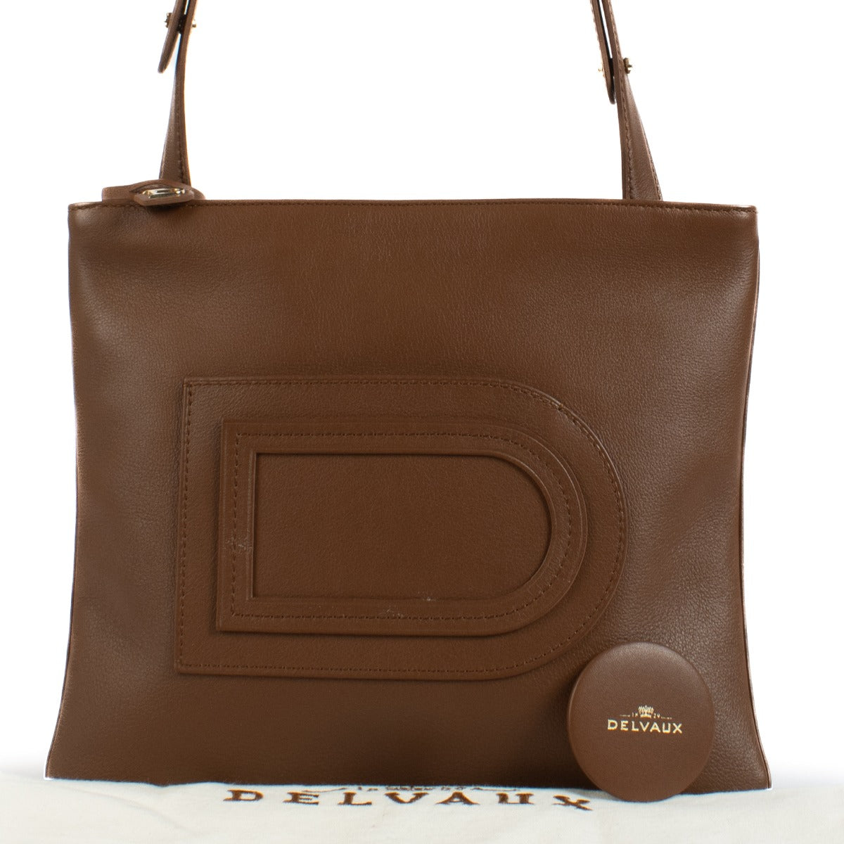 Shop safe online at Labellov in Antwerp, Brussels and Knokke this 100% authentic second hand Delvaux Cognac Louise Crossbody Bag