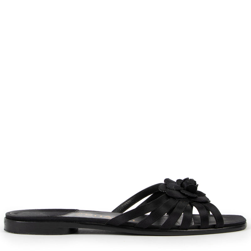 Chanel Black Camelia Sandals - size 39 for the best price at Labellov secondhand luxury. We buy and sell your authentic designer bags online.