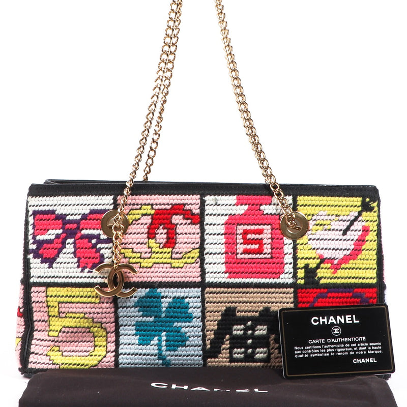 Chanel Multicolor Knit Needlepoint Lucky Charms Patchwork Shoulder Bag for the best price at Labellov secondhand luxury in Antwerp Belgium.