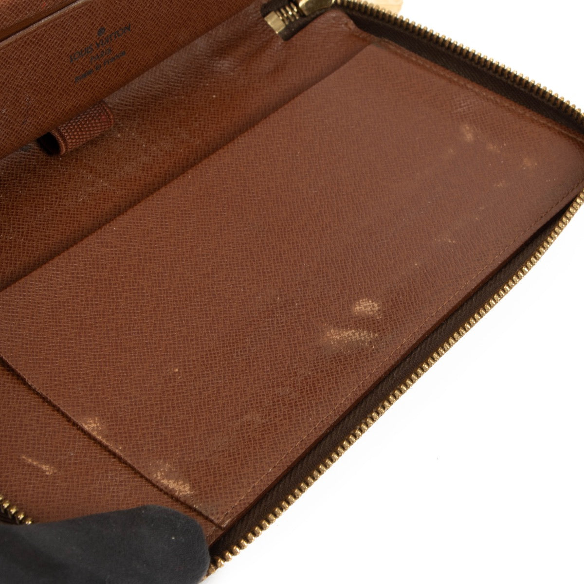 Buy now a preloved Louis Vuitton monogram Zippy organizer wallet at Labellov.com or Antwerp, Knokke or Brussels