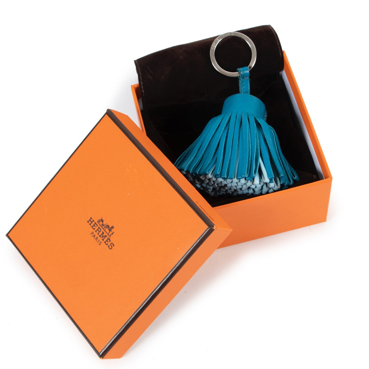 Shop safe online at Labellov in Antwerp this 100% authentic second hand Hermès Blue Leather Keychain