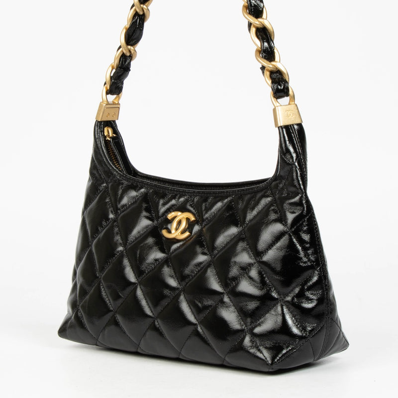 Shop 100% authentic second hand Chanel Black Lambskin Patent Hobo Bag on Labellov.com.