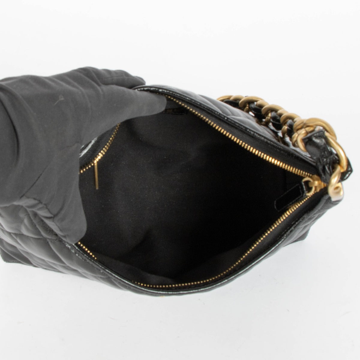 Shop 100% authentic second hand Chanel Black Lambskin Patent Hobo Bag on Labellov.com.