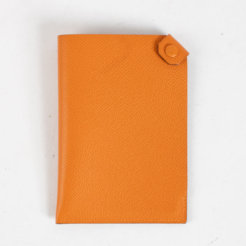 Authentic Second Hand Hermès Orange Tarmac Passport Holder on Labellov.com