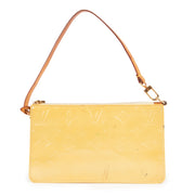 Shop safe online at Labellov in Antwerp this 100% authentic second hand Louis Vuitton Yellow Monogram Vernis Lexington Pochette