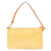 Shop safe online at Labellov in Antwerp this 100% authentic second hand Louis Vuitton Yellow Monogram Vernis Lexington Pochette